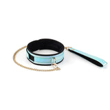 Glossy blue bondage collar with soft black velvet lining and gold chain leash from the Vivid Sorairo Soft Bondage Kit