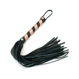 Rose gold and black leather flogger whip for bondage play from LIEBE SEELE, part of the Rose Gold Memory collection