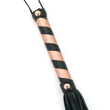 Luxury Rose Gold Memory Leather Flogger Whip for Bondage Play, featuring rose gold accents for aesthetic appeal, ideal for BDSM beginners