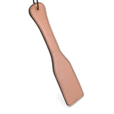 Rose gold leather spanking paddle from LIEBE SEELE with wrist loop for BDSM impact play