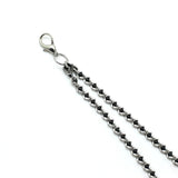 Adjustable rubber tipped nipple clamps with black bead chains for sensual bondage play