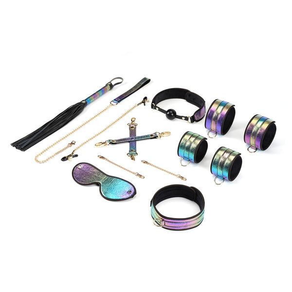 Vivid Niji bondage kit featuring holographic rainbow wrist and ankle cuffs, collar with leash, blindfold, flogger, ball gag, and nipple clamps with gold accents