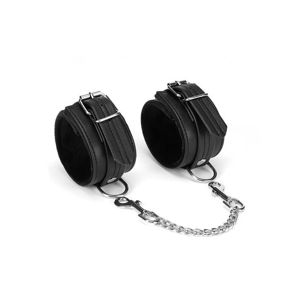 Black Bond leather ankle cuffs with soft lining and silver hardware for BDSM play, compatible with bondage accessories.