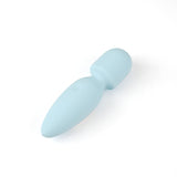 Macaron Electric Blue mini massager from beginner's BDSM bondage kit, ergonomic sky-blue silicone design for erotic exploration.