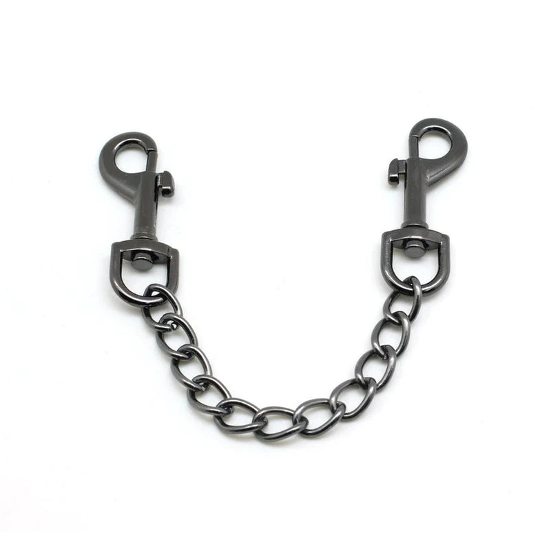 Gun metal quick release clip with chain for bondage gear connecting cuffs, showcasing durability and sleek design