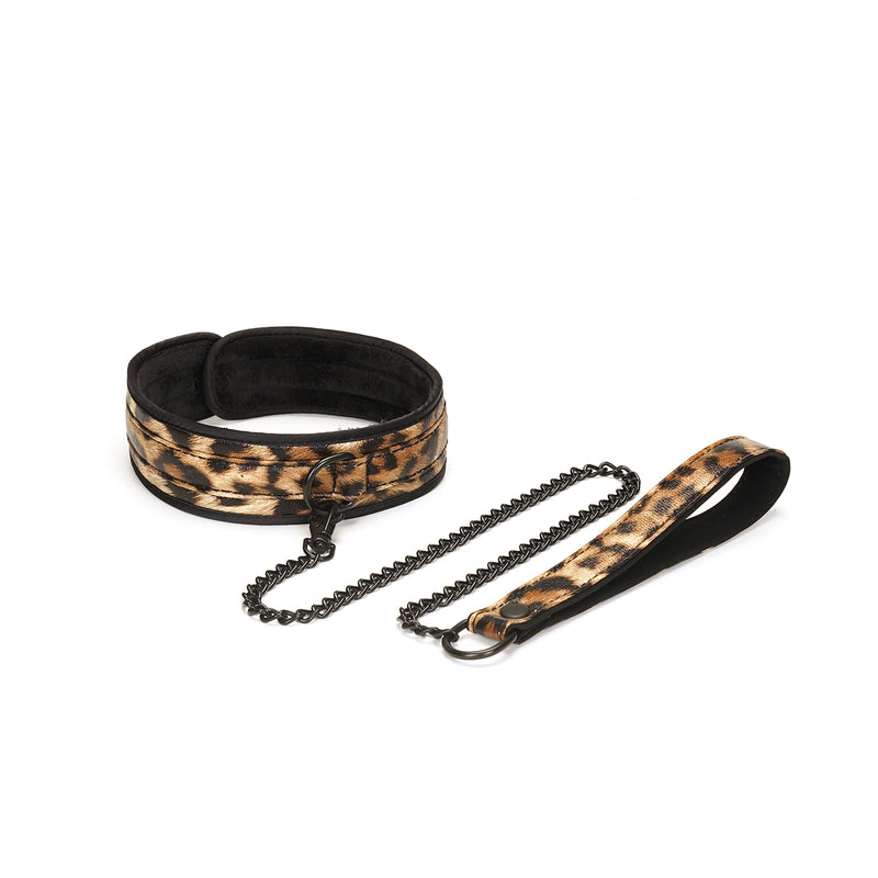 Leopard print collar with velvet lining and black metal chain leash from the Vivid Hyō Soft Bondage Kit