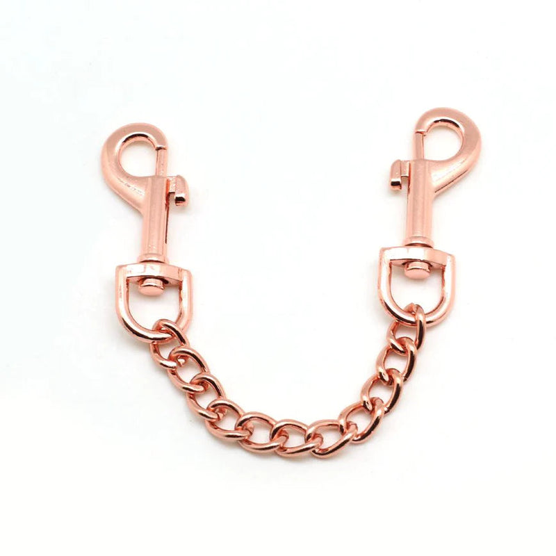 Rose gold quick release clip with chain for bondage play, durable double-ended attachment
