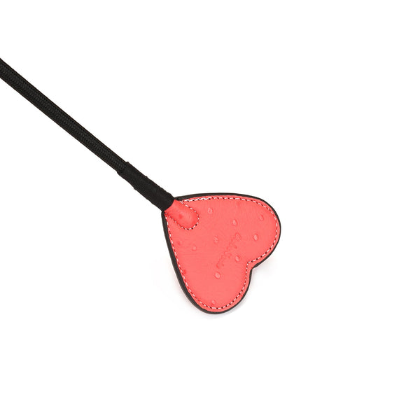 Cherry blossom pink leather riding crop with heart shape tip and wrist loop from Angel's Kiss collection