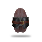 Luxurious leather pony play saddle harness with vintage gold buckle and quilted details for BDSM equestrian fantasies