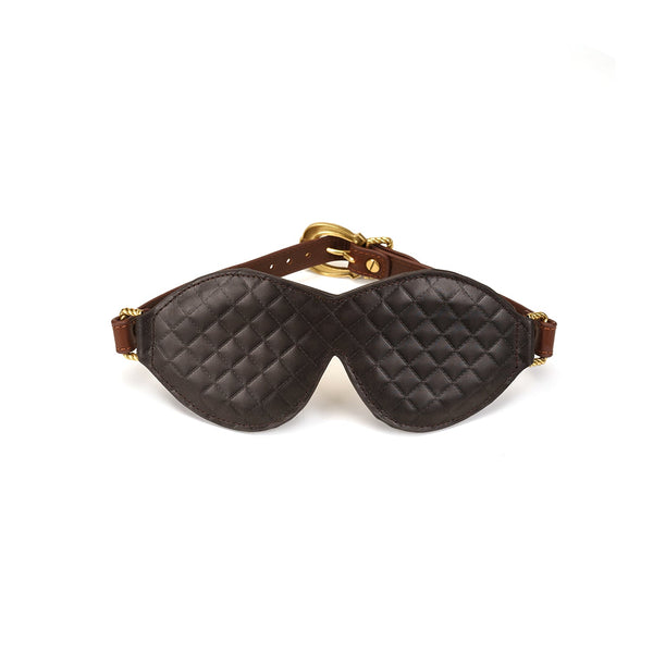 Luxurious two-tone leather bondage blindfold from The Equestrian collection, featuring quilted dark brown leather, light brown straps, and vintage gold buckle
