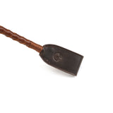 Luxury leather riding crop with braided handle and smooth tip, part of The Equestrian collection for BDSM play