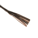 Close-up of luxury leather bullwhip tip with braided brown and tan strips, part of The Equestrian bondage collection