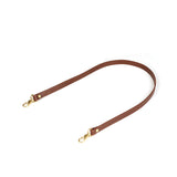 Luxurious brown leather strap with golden hardware from The Equestrian collection, ideal for BDSM pony play harness setups