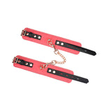 Cherry blossom pink leather ankle cuffs with rose gold chain and ostrich pattern from Angel's & Demon's Kiss collection