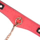 Luxurious cherry blossom pink leather bondage collar with ostrich skin pattern and rose gold chain leash from Angel's & Demon's Kiss collection