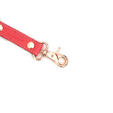 Cherry blossom pink leather hogtie with ostrich skin pattern and rose gold quick-release clip