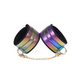 Rainbow holographic wrist cuffs with rose gold chain from Vivid Niji beginner's bondage kit