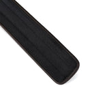 Close-up of black vegan leather bondage collar from the Vegan Fetish collection, showcasing luxurious texture and craftsmanship