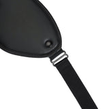 Close-up of vegan leather bondage blindfold with adjustable strap, part of an ethical BDSM collection