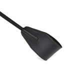 Black vegan leather riding crop with textured handle for BDSM impact play