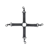 Vegan leather hog tie featuring adjustable straps with metal D-rings and clips for bondage play