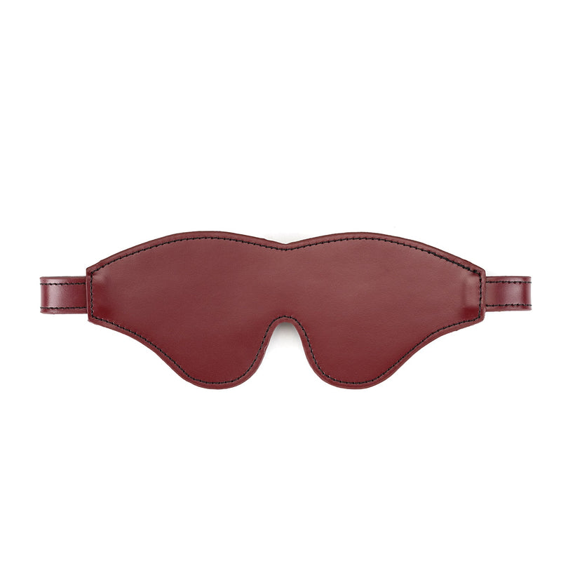 Wine red leather blindfold with rose gold buckles for sensory deprivation in bondage play, adjustable and made from high-quality leather
