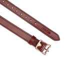 Wine red leather blindfold with rose gold buckle from Liebe Seele, showcasing adjustable strap and luxurious design for erotic sensory deprivation play
