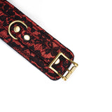 Victorian Garden vegan leather handcuff with black lace detail and gold-colored buckle, ideal for BDSM play