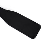 Black vegan leather spanking paddle, part of the Victorian Garden collection, designed for beginner-friendly BDSM play
