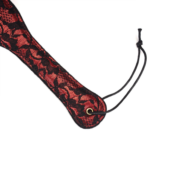 Red and black lace-covered vegan leather spanking paddle from the Victorian Garden collection, designed for diverse impact play