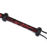 Red and black lace vegan leather bullwhip from Victorian Garden collection, featuring wrist loop for impact play