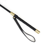 Victorian Garden BDSM riding crop with patterned black handle and brass accents, featuring a slender wrist loop