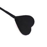 Heart-shaped tip of Victorian Garden BDSM riding crop in black, ideal for diverse spanking experiences