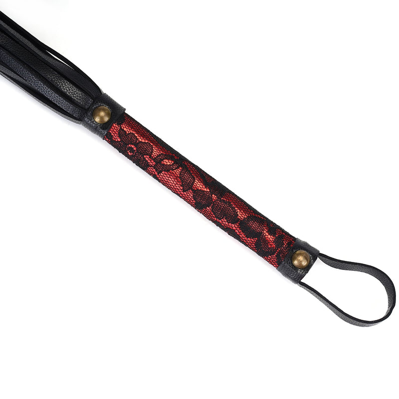 Red and black Victorian Garden lace vegan leather flogger for bondage play featuring brass accents and wrist loop
