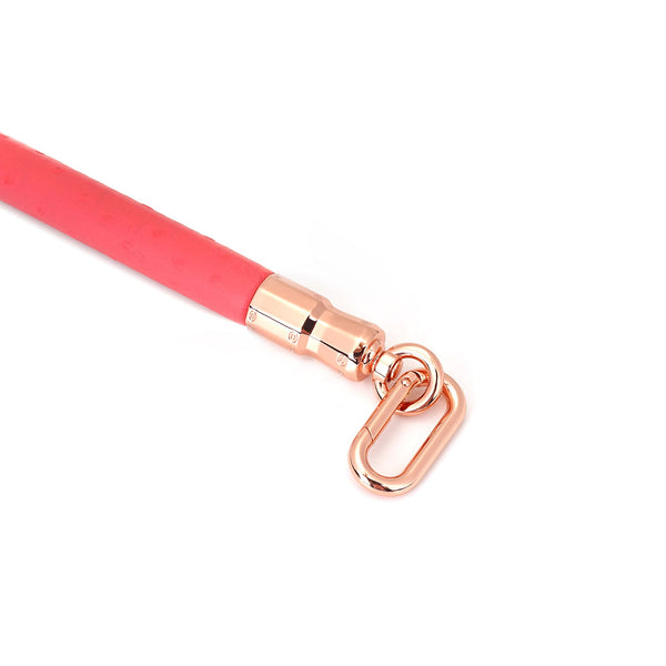 Cherry blossom pink leather-coated leg spreader bar with rose gold quick-release clip from Angel's & Demon's Kiss collection