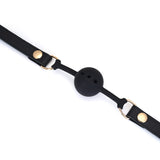 Demon's Kiss Breathable Silicone Ball Gag with black leather straps and golden hardware detailing for BDSM and bondage play