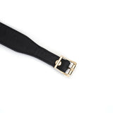 Luxurious black leather bondage collar with ostrich skin pattern and gold buckle, part of the Demon's Kiss collection