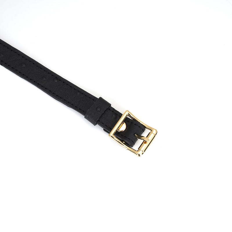 Black leather 'Slut' choker with golden buckle from the Angel's & Demon's Kiss Bondage collection