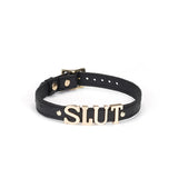 Black leather 'Slut' choker with ostrich skin pattern and golden hardware from the Angel’s & Demon’s Kiss collection