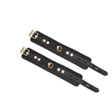 Luxurious black leather ankle cuffs with ostrich skin pattern and gold hardware from the Demon's Kiss collection
