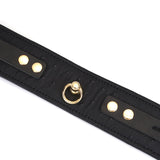Black leather ankle cuff with ostrich skin pattern and gold hardware from Demon's Kiss collection