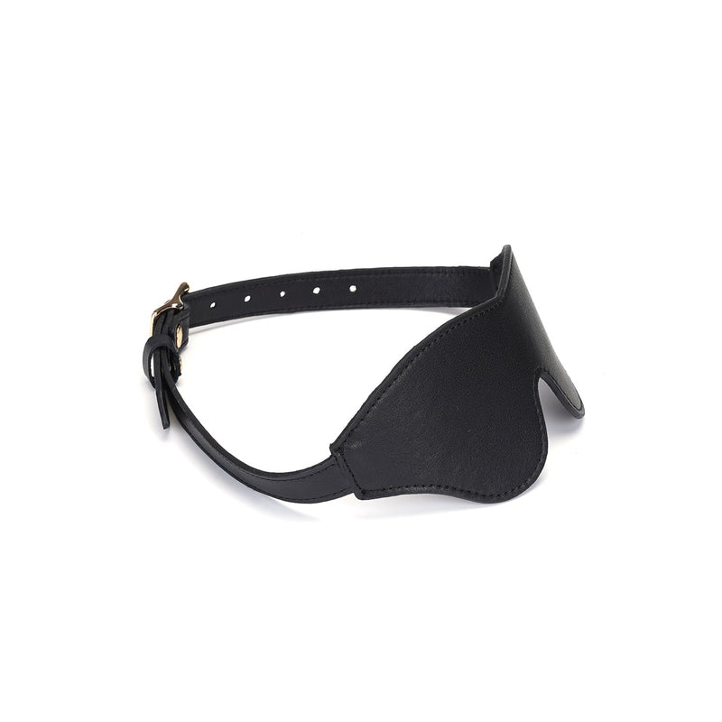 Luxurious black leather blindfold with gold buckle, designed for sensory deprivation in BDSM play, part of the Dark Secret bondage collection