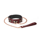 Wine Red leather bondage collar with plush black interior and rose gold chain leash from the advanced bondage kit collection