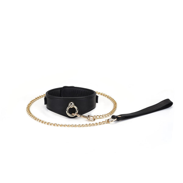 Premium black leather bondage collar with gold chain leash and quick-release clip, part of Dark Secret collection