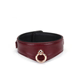 Wine Red leather bondage collar with rose gold metal ring and luxurious black interior, ideal for BDSM play