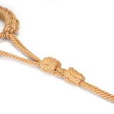 Khaki shibari rope handcuffs from Bound You II collection, demonstrating intricate knotwork for Shibari-inspired bondage play.
