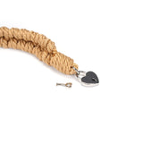 Khaki shibari rope collar with heart-shaped padlock for bondage play