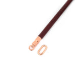 Wine Red leather-coated spreader bar with rose gold metallic accents for BDSM restraint play