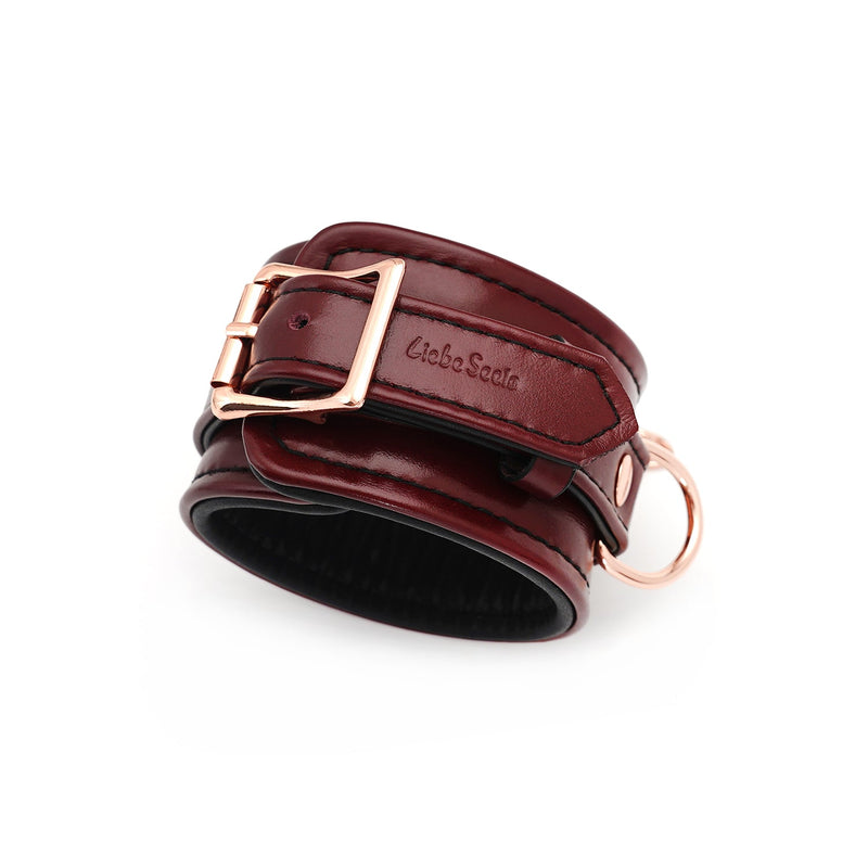 Luxurious wine red leather ankle cuffs with rose gold hardware from LIEBE SEELE's bondage gear collection