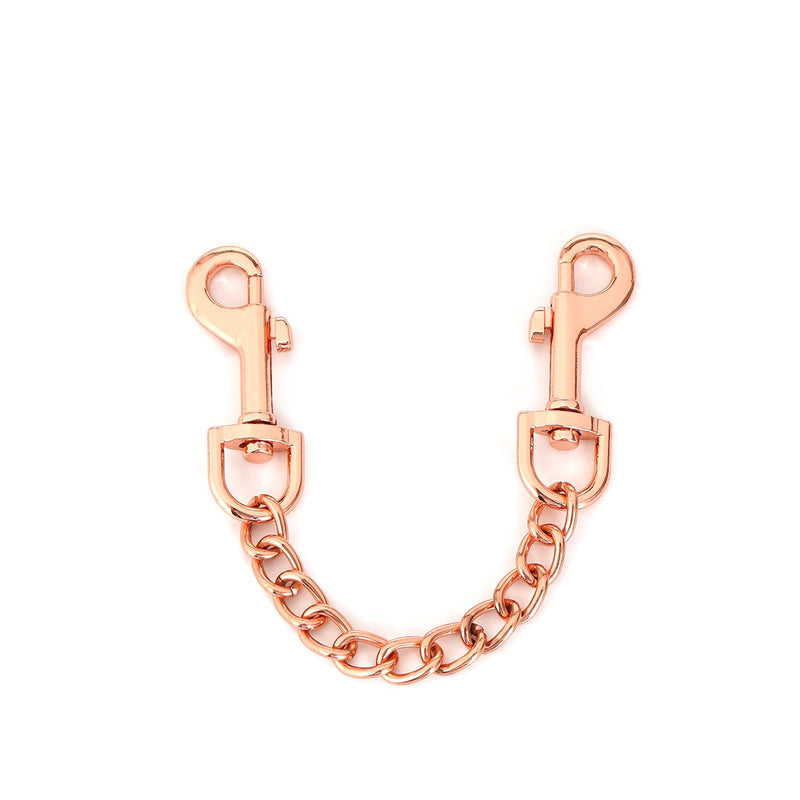 Rose gold quick-release clips with chain for BDSM handcuffs, part of the Pink Dream collection